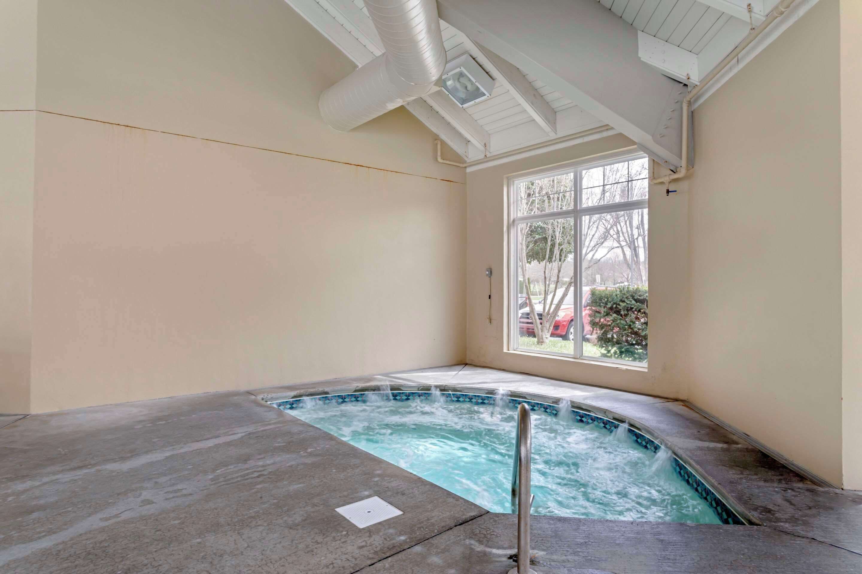 indoor pool, seasonal outdoor pool, pool umbrellas, pool loungers