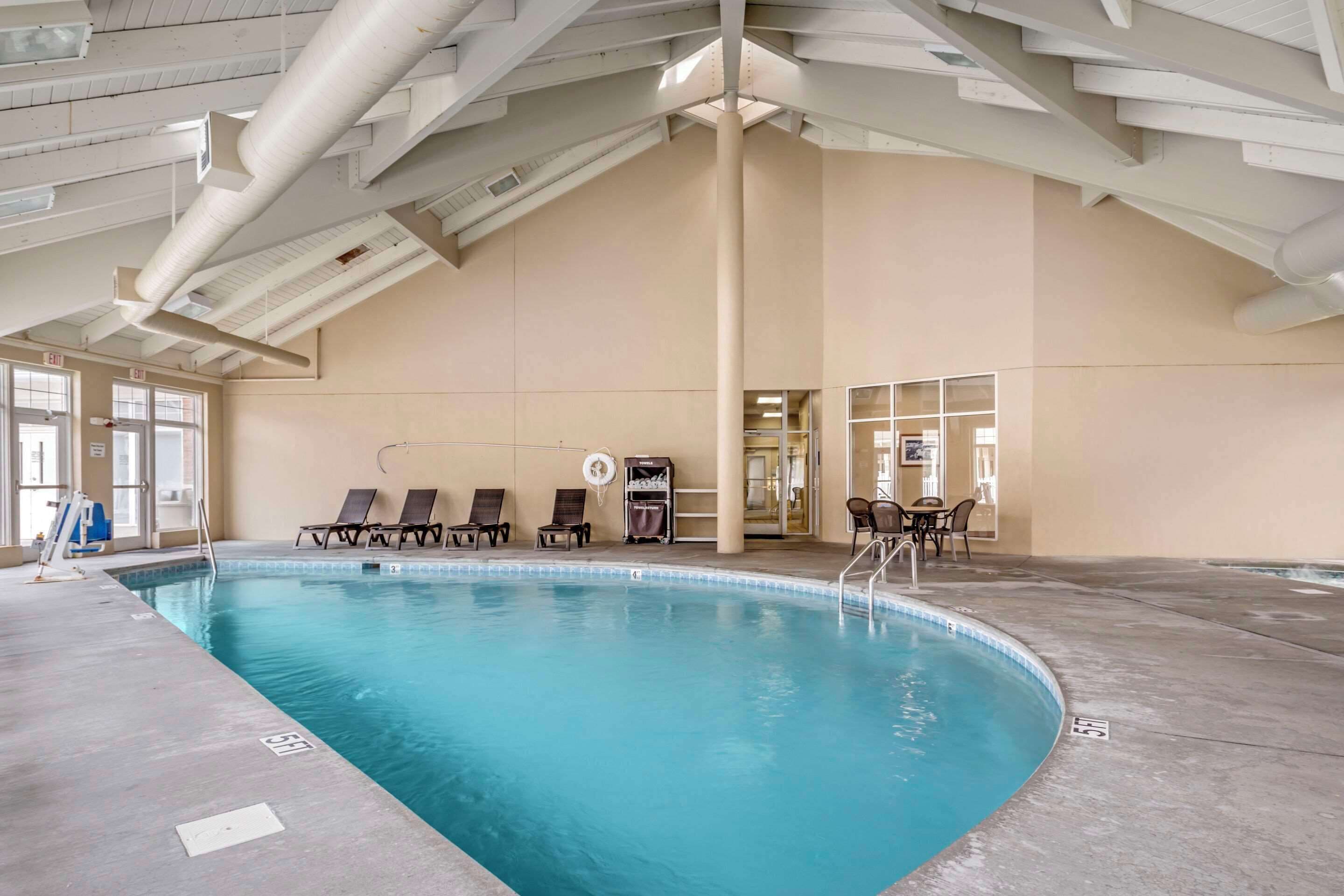 Indoor pool, seasonal outdoor pool, pool umbrellas, sun loungers