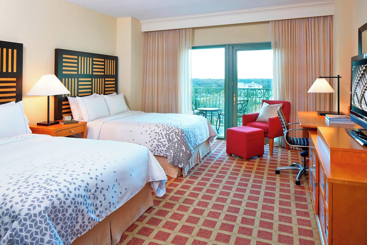 Premium bedding, down comforters, pillowtop beds, minibar