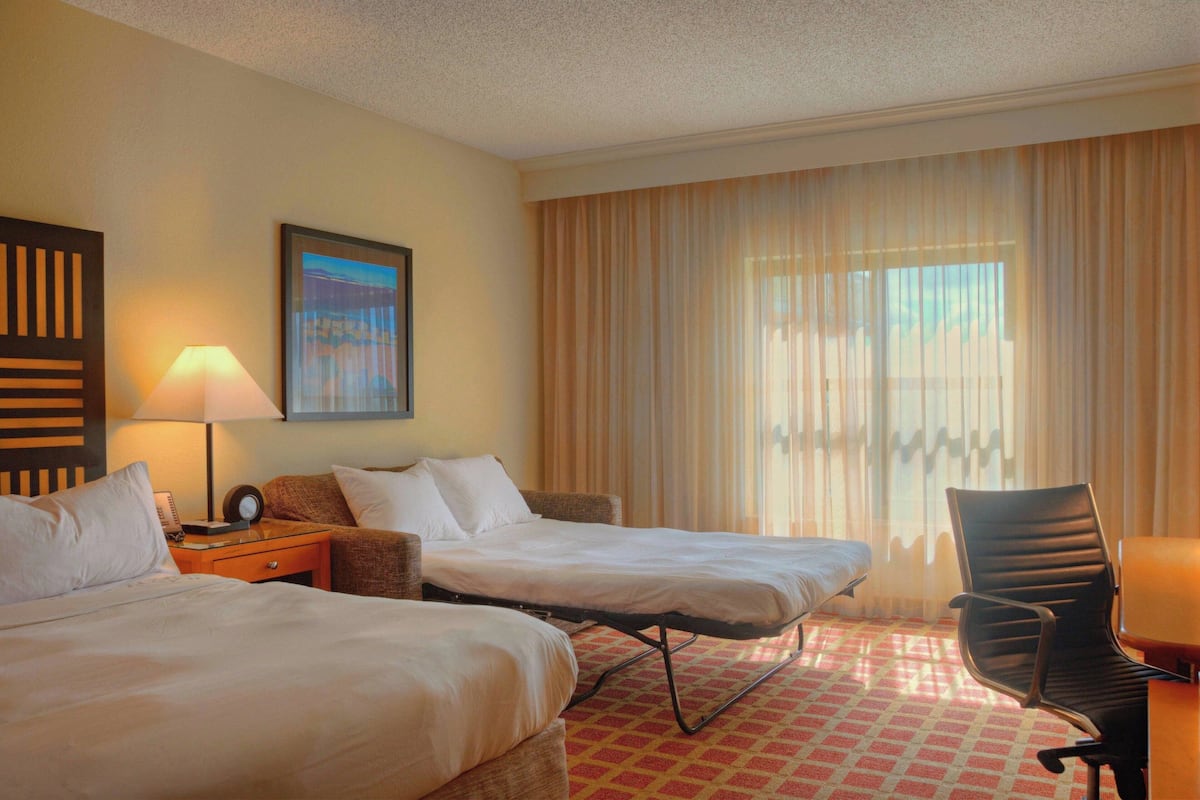 Premium bedding, down comforters, pillowtop beds, minibar