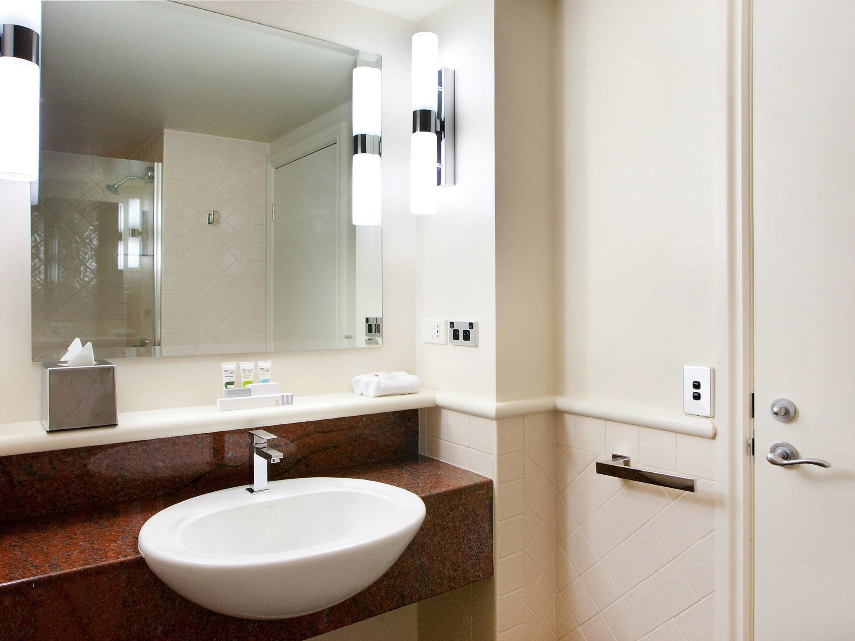 eco-friendly toiletries, hair dryer, towels