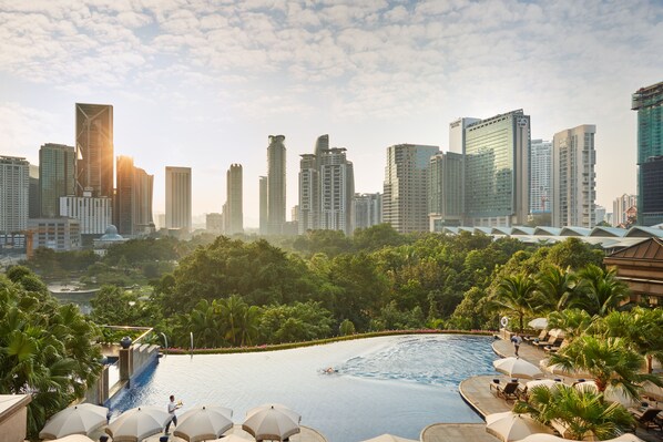 Outdoor pool, pool umbrellas, sun loungers