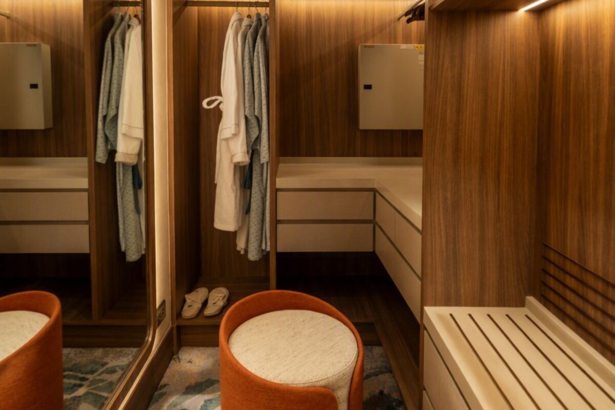 Luxe beddengoed, donsdekens, pillowtop-bedden, een minibar