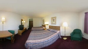 In-room safe, desk, blackout curtains, iron/ironing board - Rodeway Inn Coopersville (Coopersville)