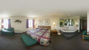 In-room safe, desk, blackout curtains, iron/ironing board - Rodeway Inn Coopersville (Coopersville)