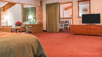 Suite, 1 King Bed | In-room safe, desk, blackout curtains, iron/ironing board