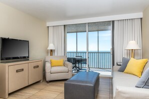 Beach Front Suite | Living area | 42-inch flat-screen TV with cable channels, TV, pay movies