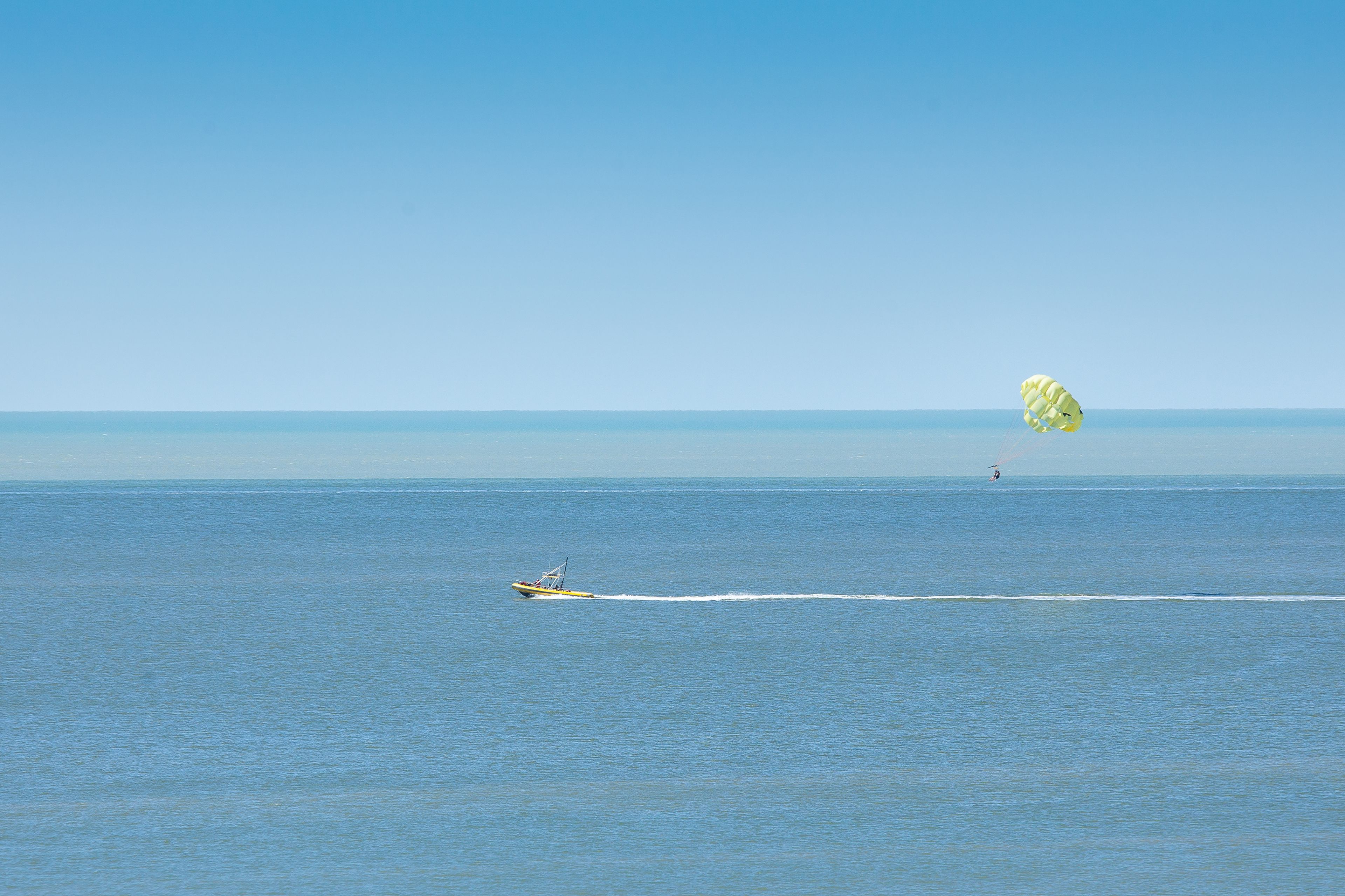 on the beach, white sand, sun-loungers, beach umbrellas