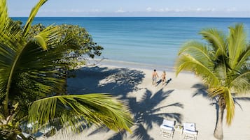 Private beach, white sand, sun loungers, beach towels