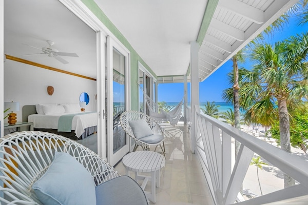 Beachfront Suite | Premium bedding, minibar (free items), in-room safe, desk