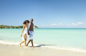 Private beach, white sand, sun-loungers, beach towels