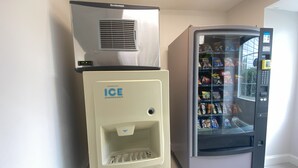 A vending machine with a freezer compartment and an ice dispenser. - Red Roof Inn Winston-Salem (Winston-Salem)
