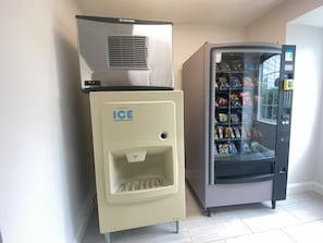 A vending machine with a freezer compartment and an ice dispenser. - Red Roof Inn Winston-Salem (Winston-Salem)