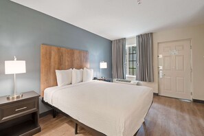 Tabla de planchar con plancha, wifi gratis y ropa de cama 