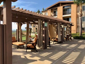 2 outdoor pools, open 9 AM to 10 PM, free cabanas, pool umbrellas