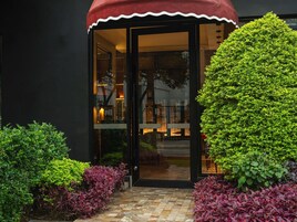 Breakfast, lunch, dinner served; local cuisine, garden views 