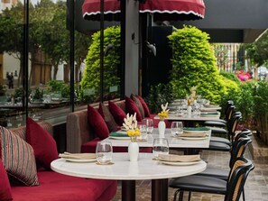 Breakfast, lunch, dinner served; local cuisine, garden views 