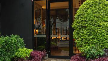 Breakfast, lunch, dinner served; local cuisine, garden views