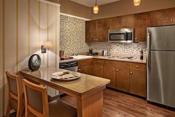 Fridge, microwave, stovetop, dishwasher at Sonesta Suites Scottsdale Gainey Ranch
