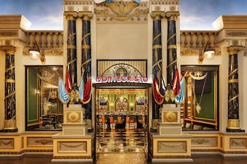 A gym with multiple treadmills, ellipticals, and weight machines. at Paris Las Vegas Resort & Casino
