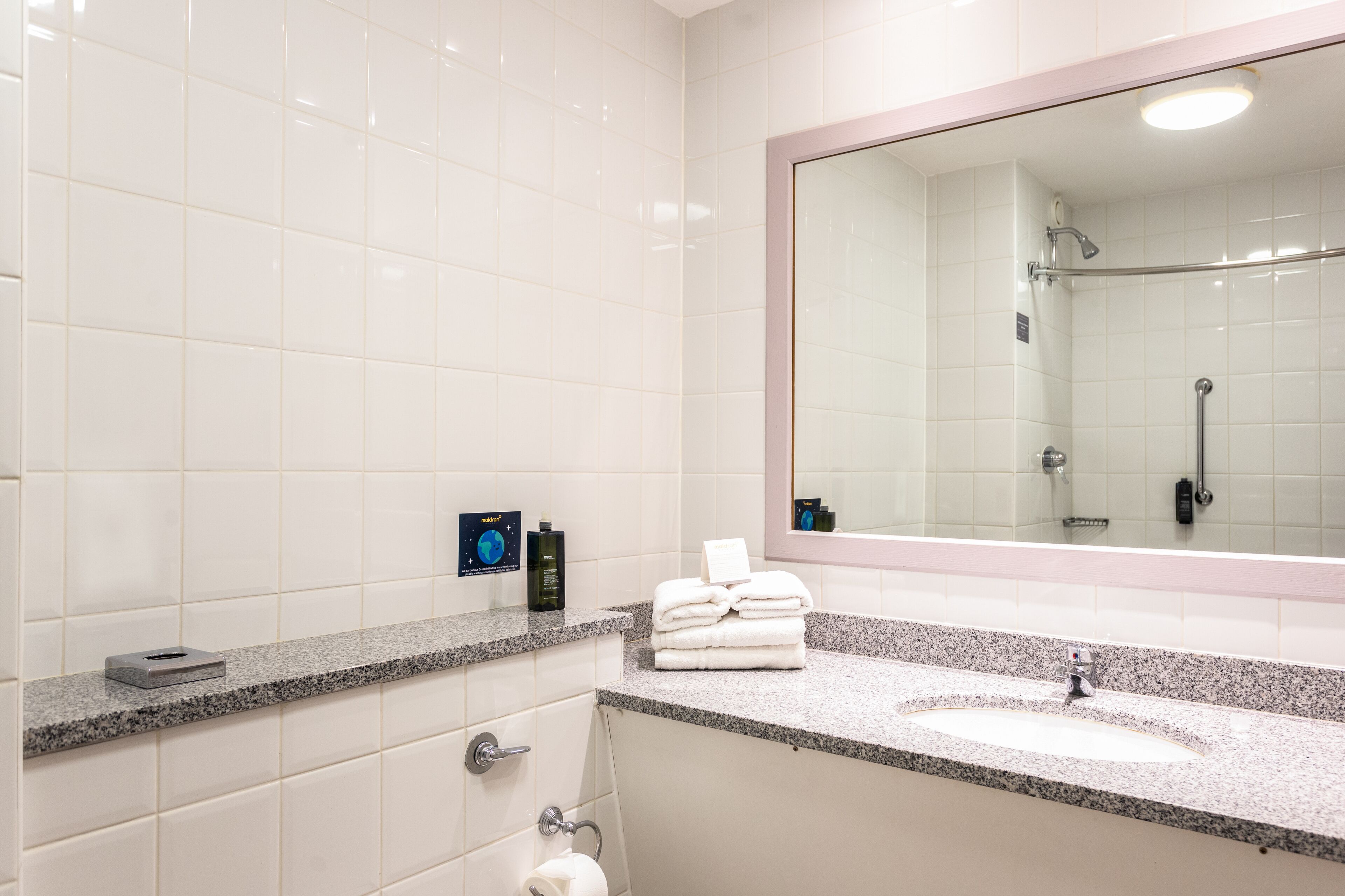 combined shower/bathtub, eco-friendly toiletries, hair dryer, towels