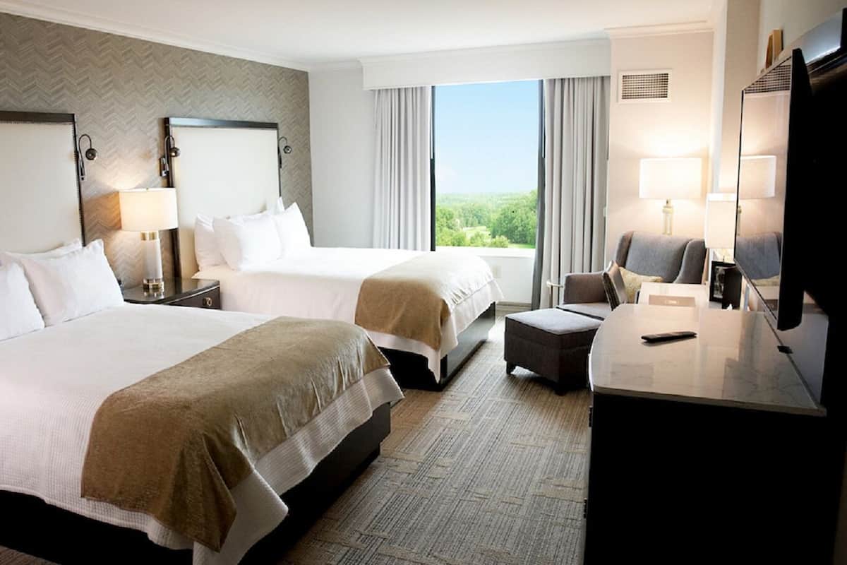 Premium bedding, down duvets, pillow-top beds, in-room safe