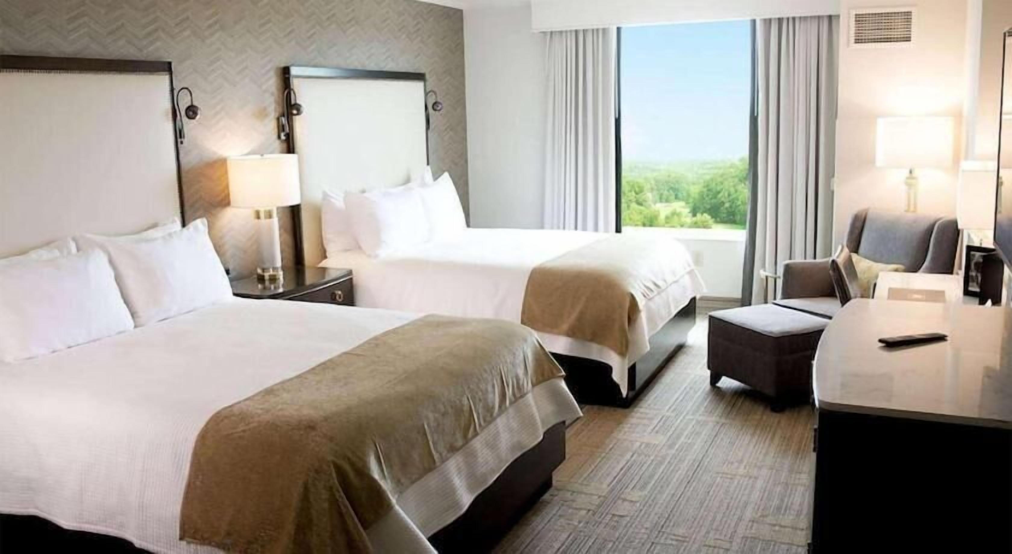 Premium bedding, down comforters, pillowtop beds, in-room safe