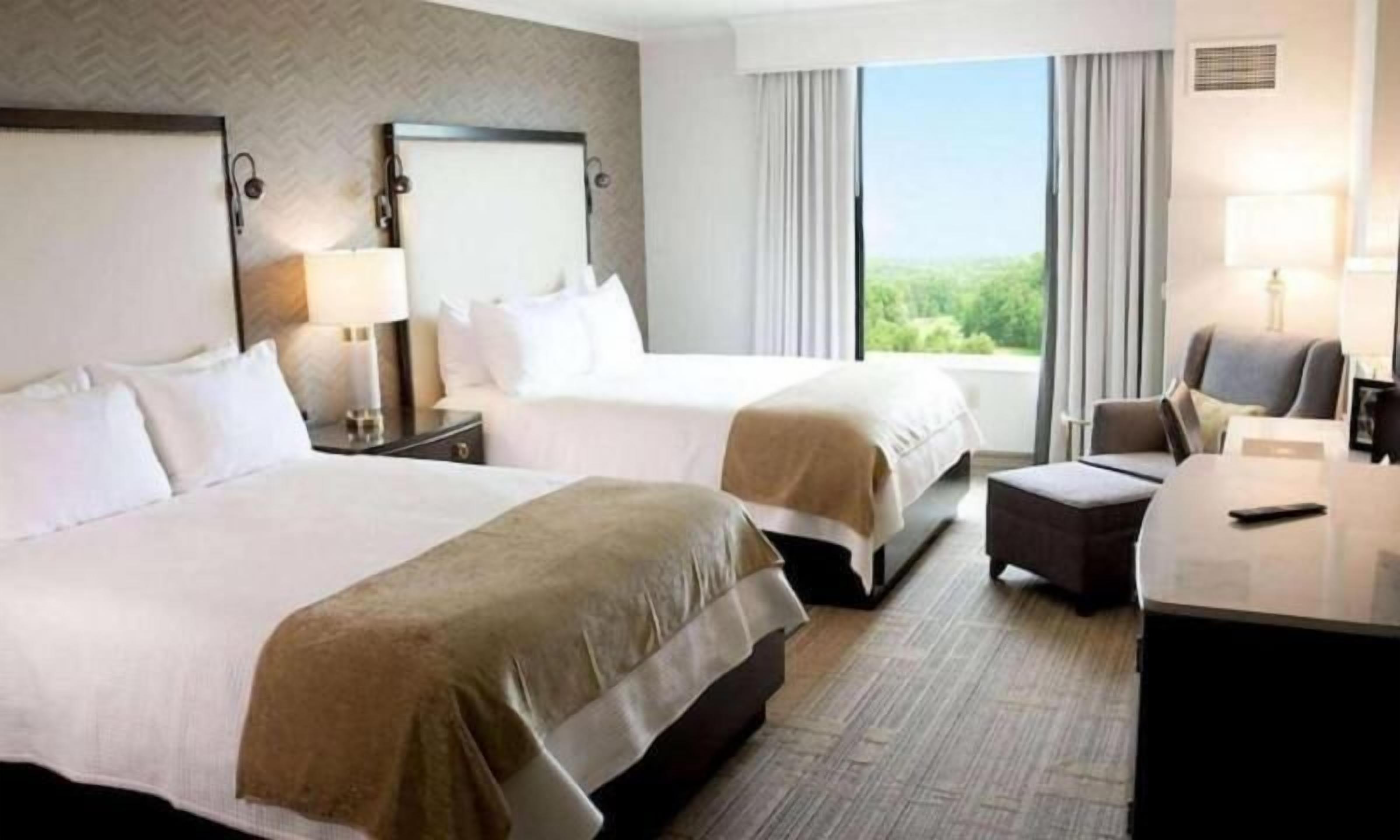 Premium bedding, down comforters, pillowtop beds, in-room safe