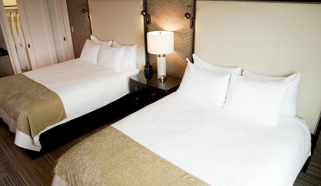 Premium bedding, down comforters, pillowtop beds, in-room safe