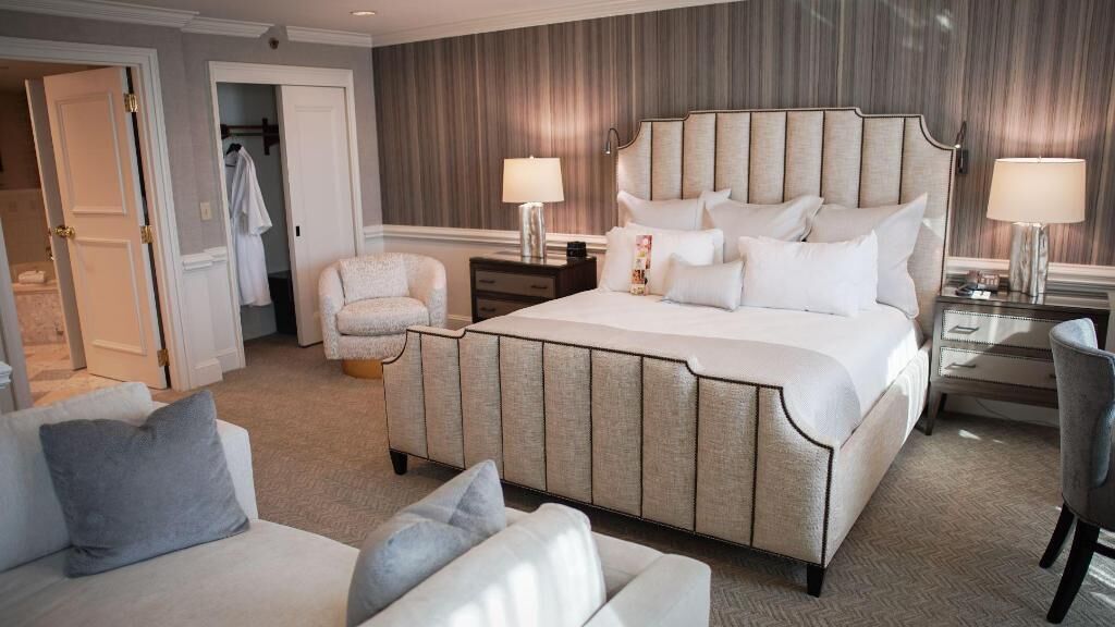 Premium bedding, down comforters, pillowtop beds, in-room safe