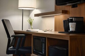 Premium bedding, desk, laptop workspace, blackout curtains