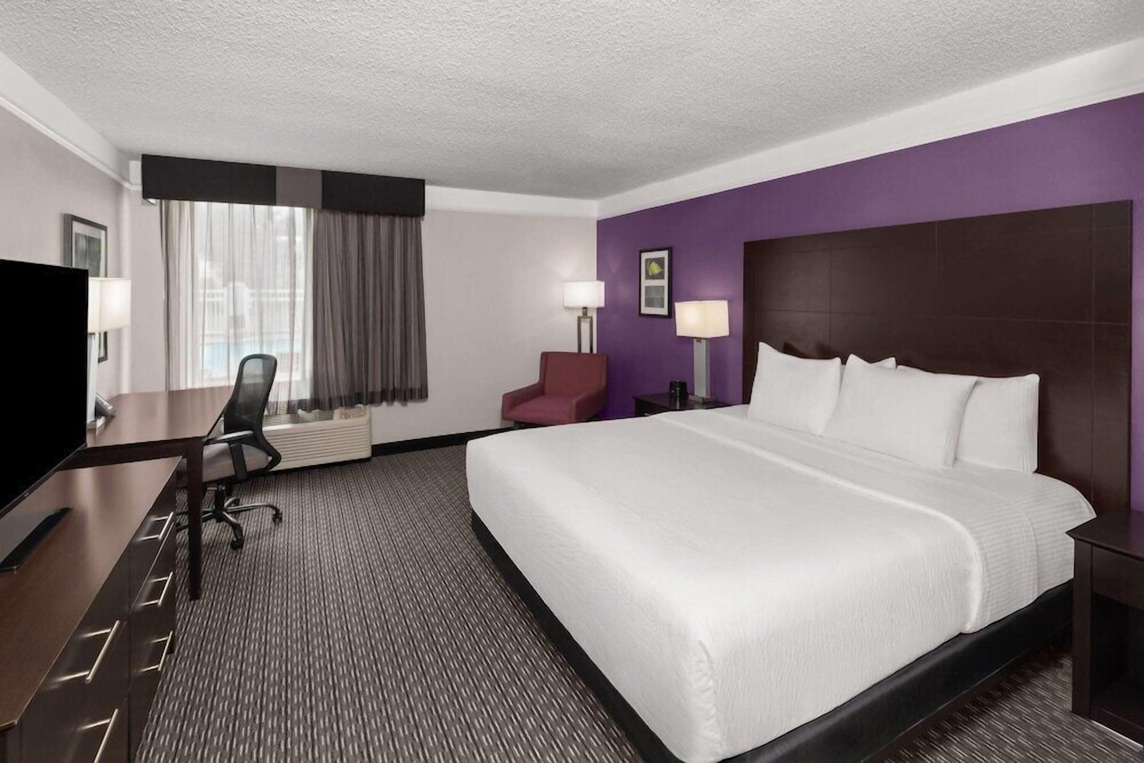 Premium bedding, pillowtop beds, desk, laptop workspace