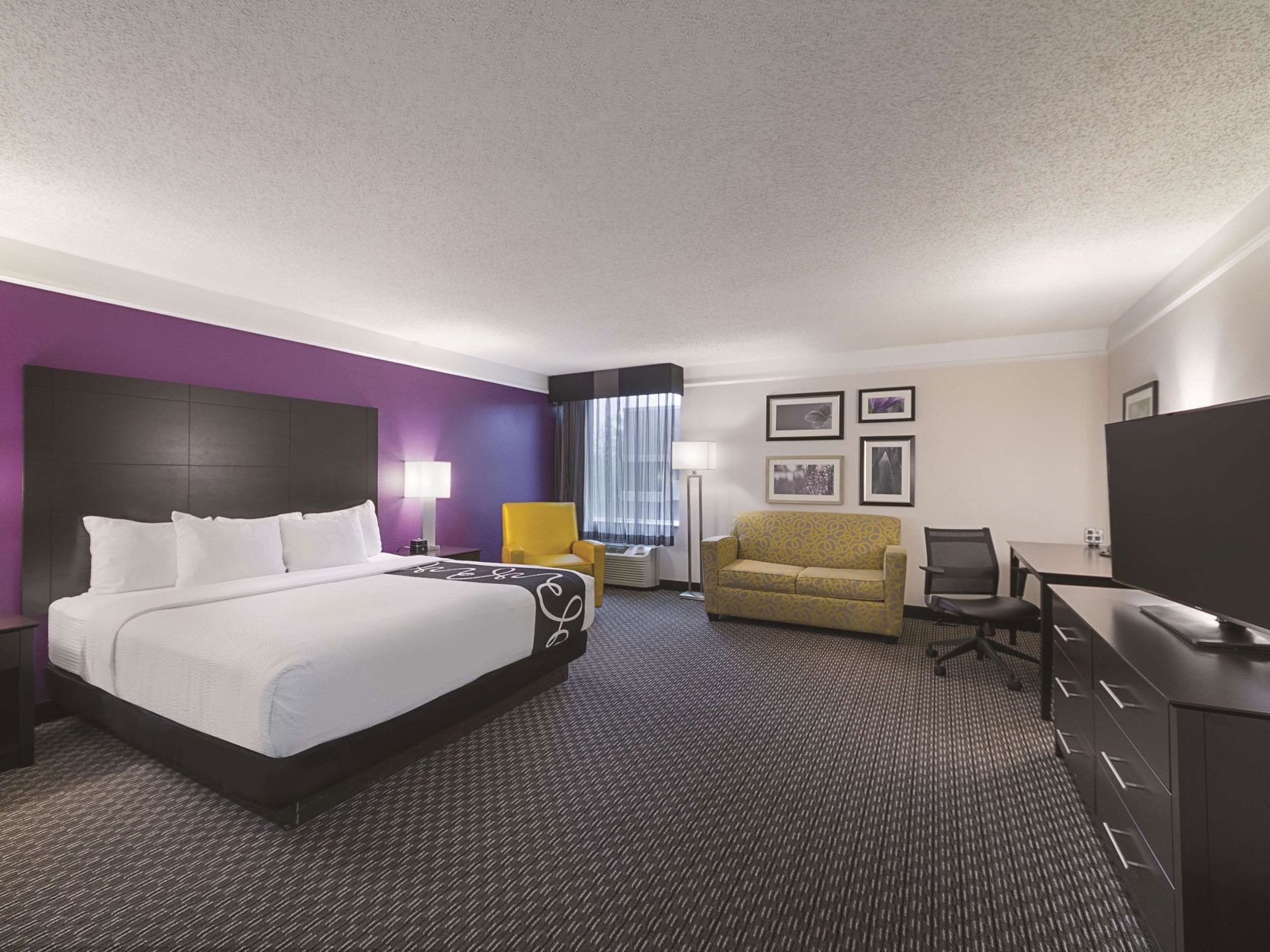 Premium bedding, pillowtop beds, desk, laptop workspace