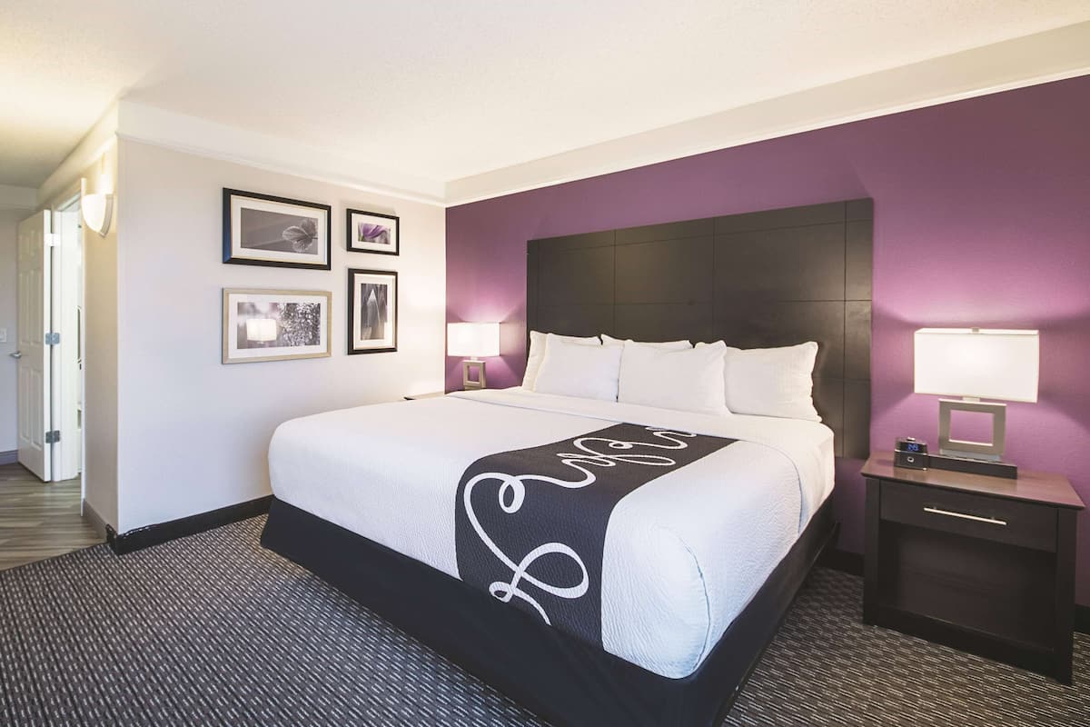 Premium bedding, pillow-top beds, desk, laptop workspace