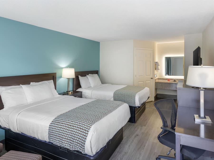 Desk, blackout curtains, iron/ironing board, free cots/infant beds