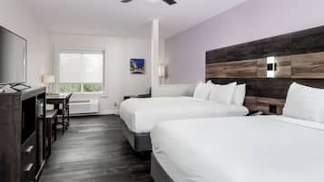 Habitación Deluxe, 2 camas Queen size, para no fumadores | Ropa de cama de alta calidad, escritorio y cortinas blackout