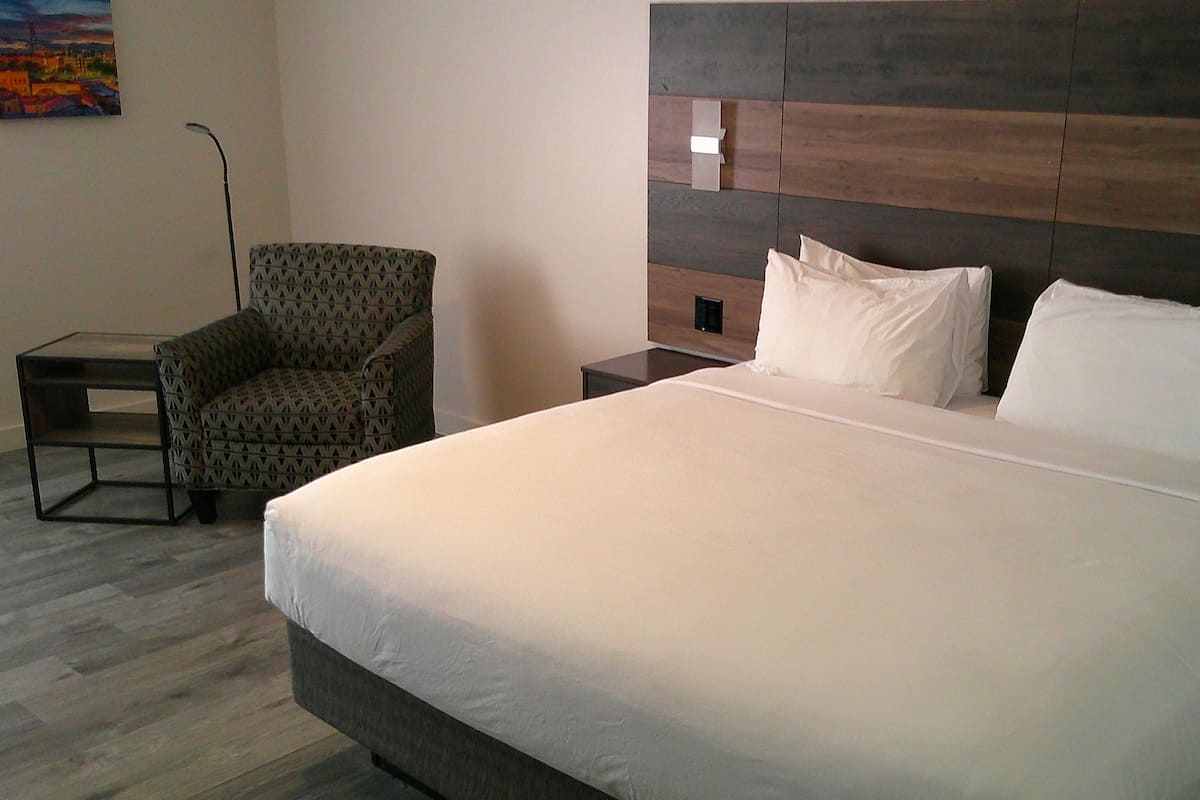 Premium bedding, desk, blackout drapes, iron/ironing board