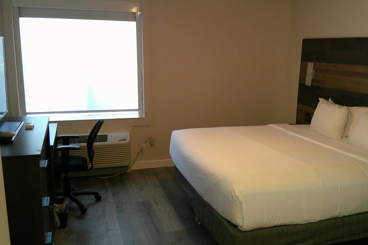Premium bedding, desk, blackout drapes, iron/ironing board