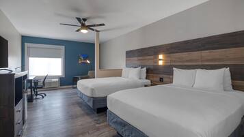 Habitación estándar, 2 camas Queen size, para no fumadores (Larger Room) | Ropa de cama de alta calidad, escritorio y cortinas blackout