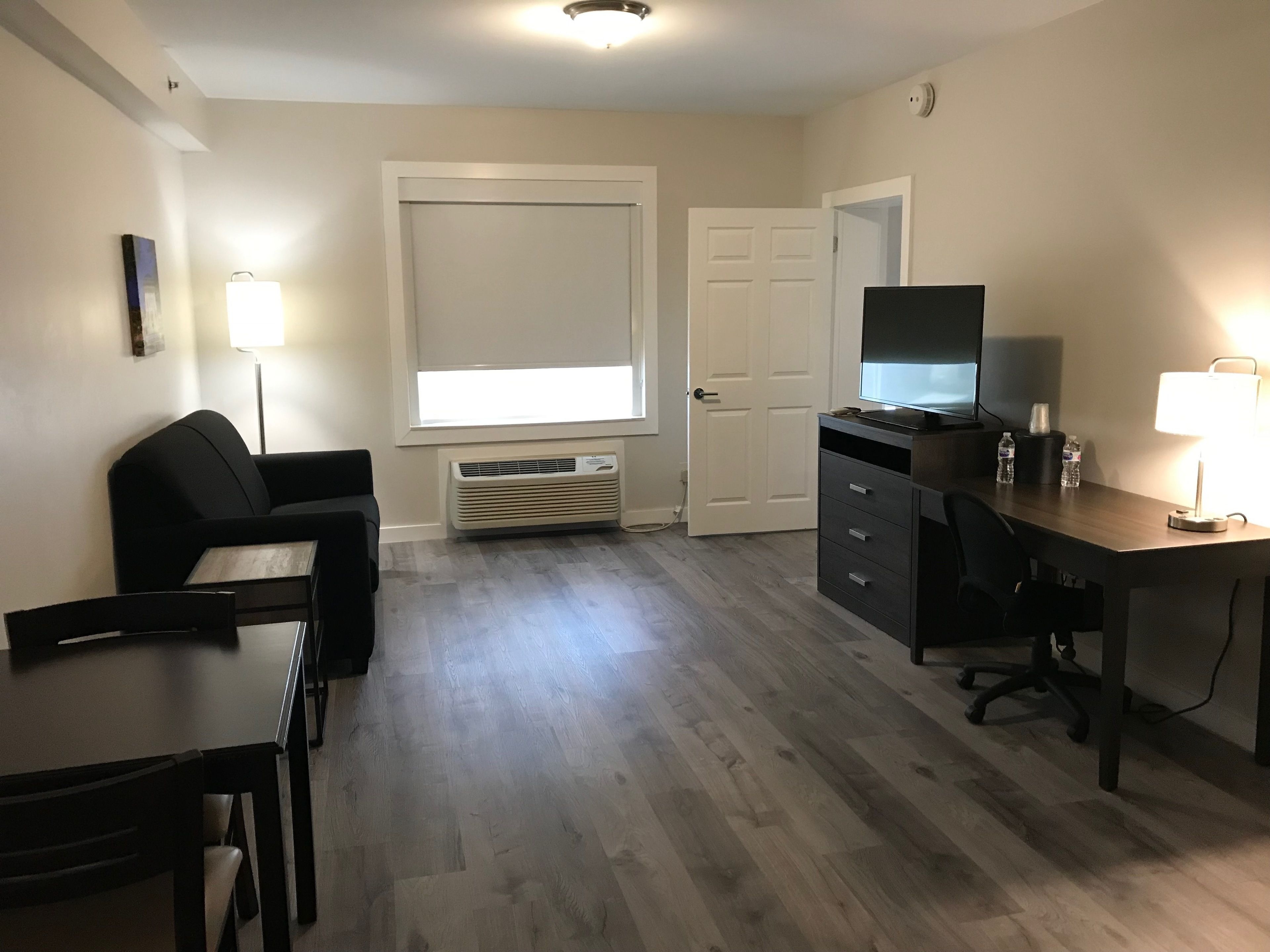 suite, 1 king bed, non smoking (one-bedroom) | premium bedding, desk, blackout curtains, iron/ironing board