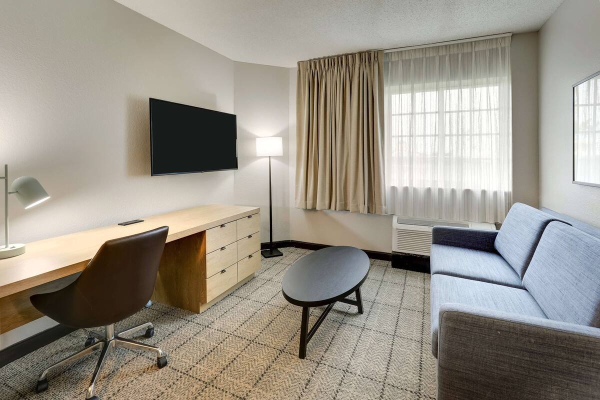 Desk, laptop workspace, blackout curtains, free WiFi