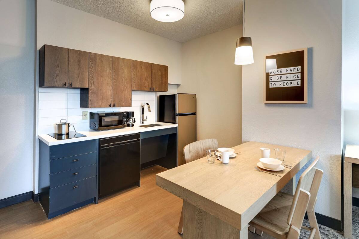 suite, 1 queen bed with sofa bed, accessible (mobility tub one bedroom) | private kitchenette | coffee/tea maker