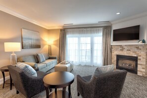 Suite, Lake View (Specialty) | Living area | TV, DVD player, pay movies