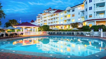 Seasonal outdoor pool, open 8:00 AM to 11:00 PM, pool umbrellas