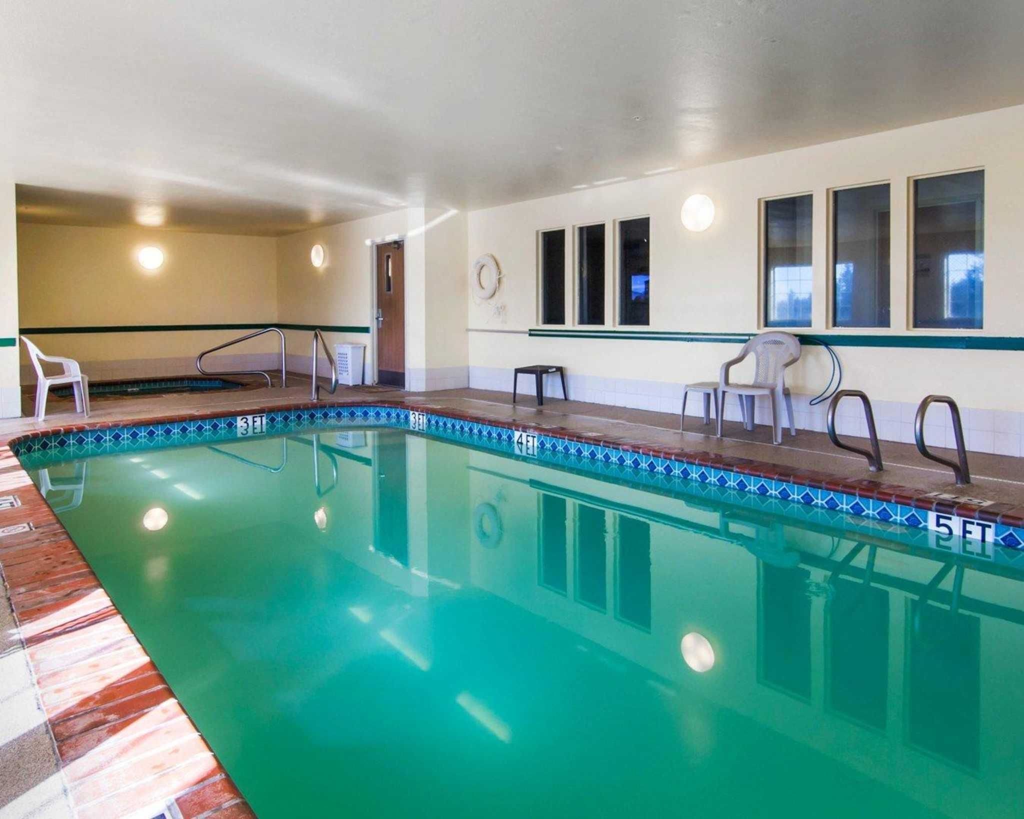 Indoor pool, open 7:00 AM to 10:00 PM, pool loungers