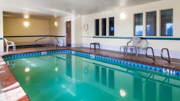 Indoor pool, open 7:00 AM to 10:00 PM, pool loungers