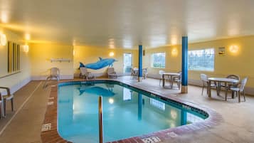 Indoor pool, open 7:00 AM to 10:00 PM, pool loungers