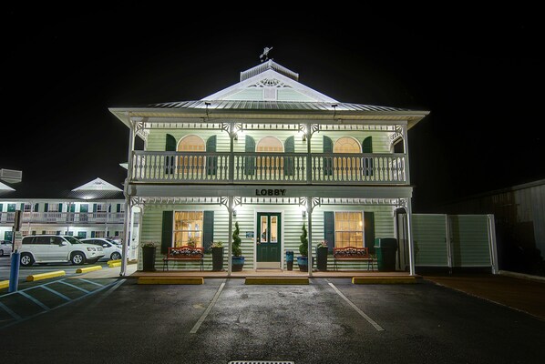 Welcome to the hotel, featuring a grand lobby entrance with a central doorway and flanked by windows.