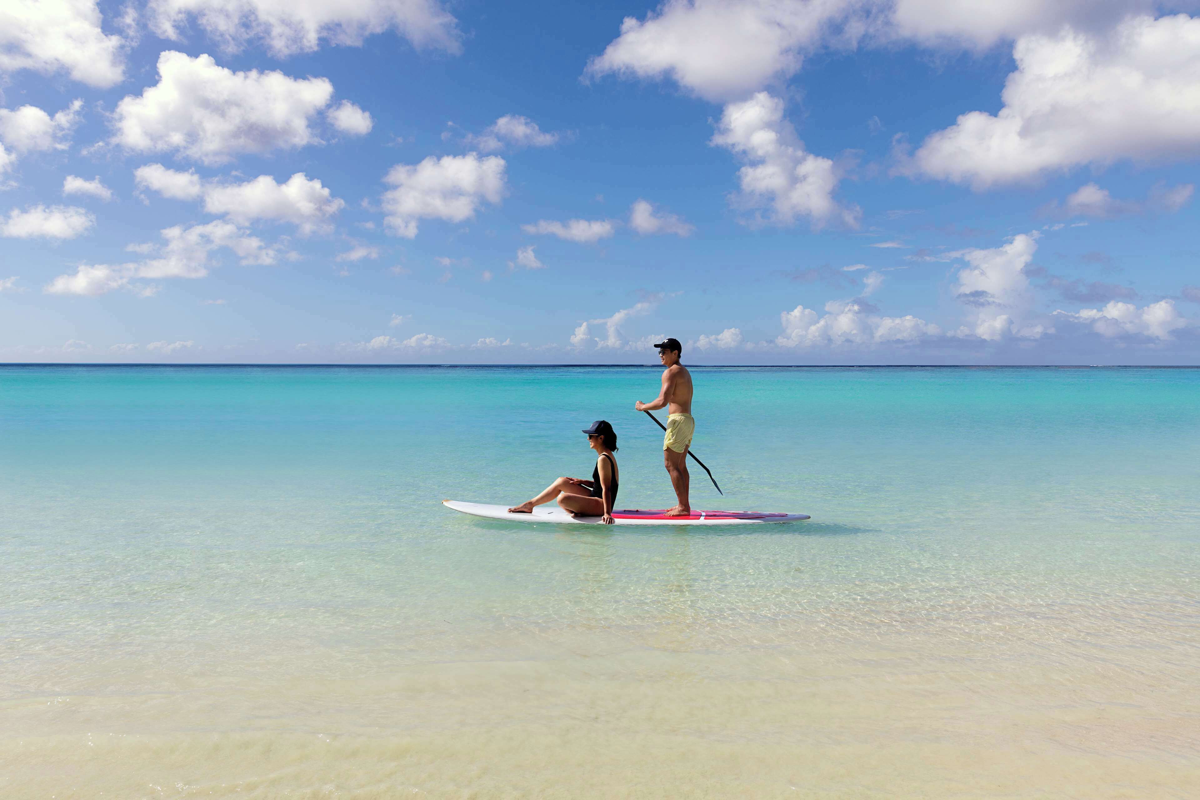 on the beach, white sand, sun-loungers, beach umbrellas