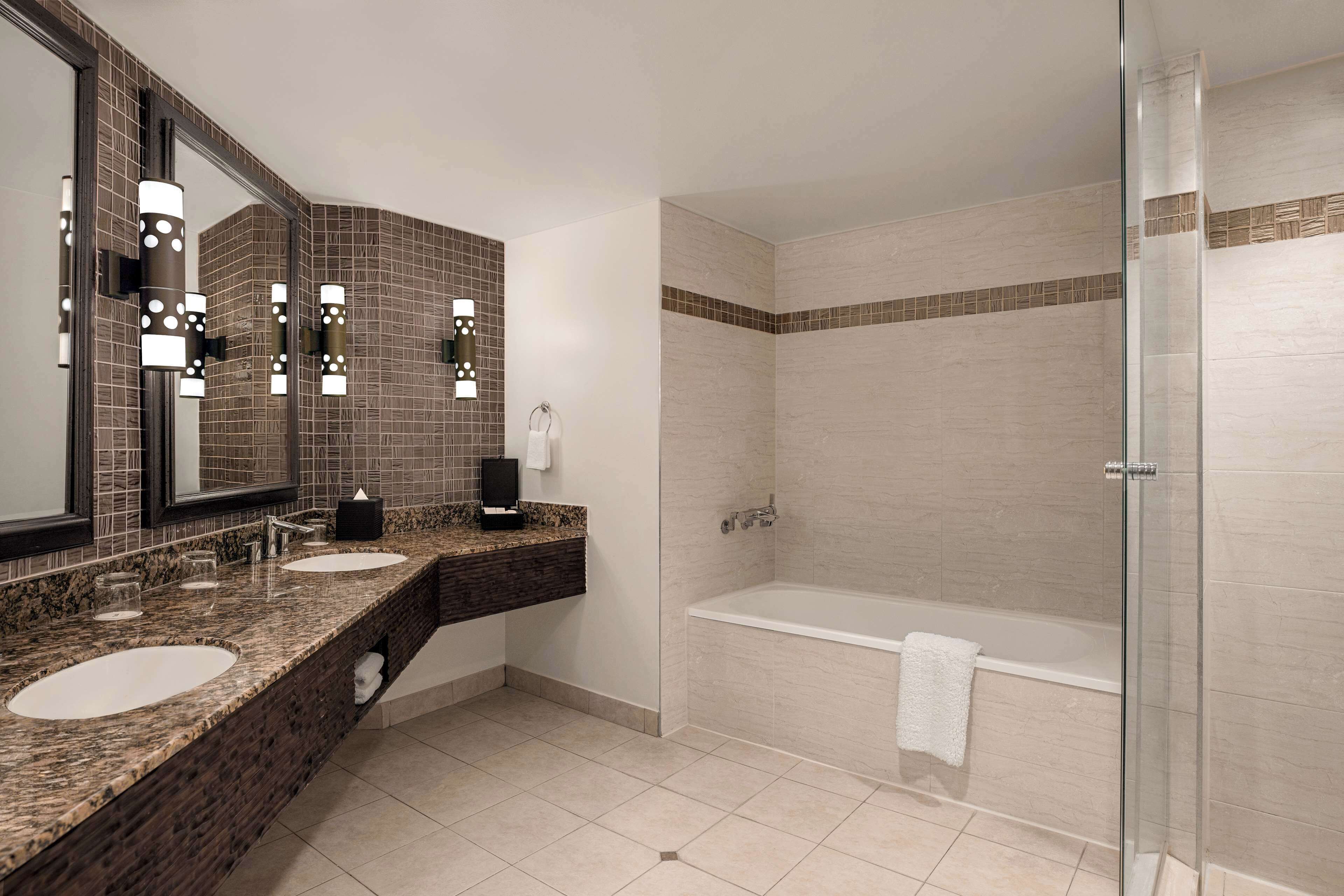 combined shower/bathtub, free toiletries, hair dryer, bathrobes